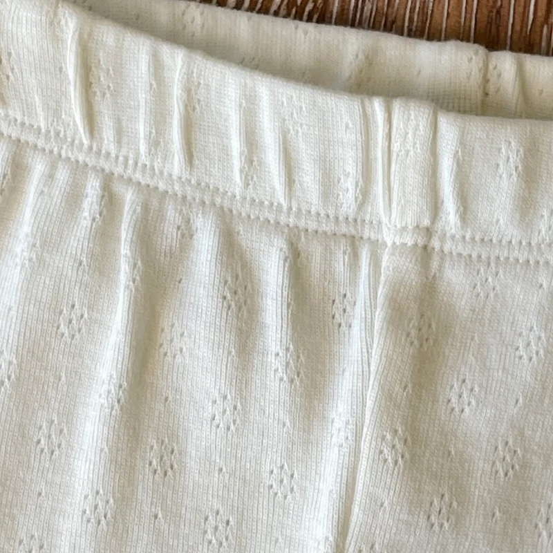 Pointelle Stretch Knit Legging Pant, Soft White. Pants Shown in 6 to 12 months. Call for available Sizes, 303-744-7464