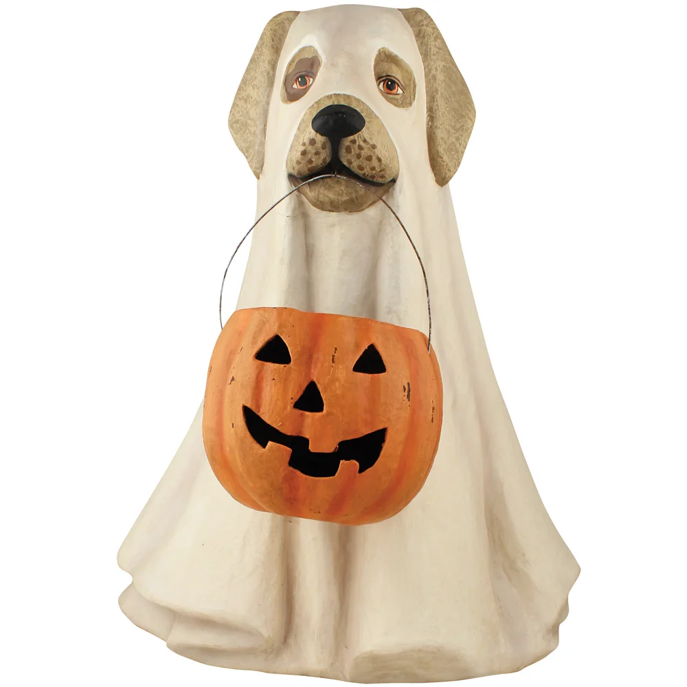 This adorabledogpeeps out from itsHalloween ghost costume. A jack o'lantern hangs from its mouth to fill with candy!